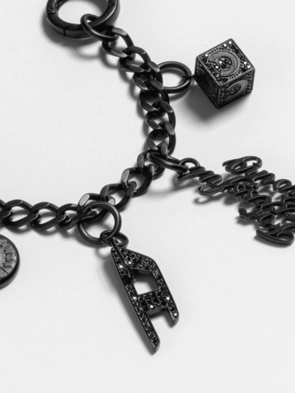 DIESEL Matte Black Thin Metal Phone Charm